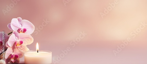 Orchid flowers adorn a lit ...