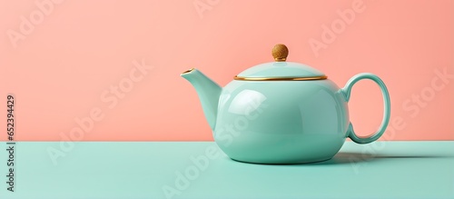 Teapot in close up isolated pastel background Copy space