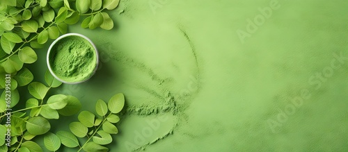 Obraz na płótnie Powdered supplement derived from Moringa isolated pastel background Copy space w salonie