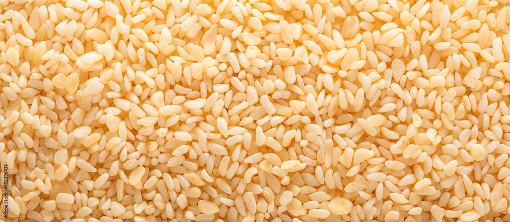 Top view closeup detail of isolated pastel background Copy space texture with Indian puffed rice cereal or murmure in a gunny sack appearing crispy and sweet