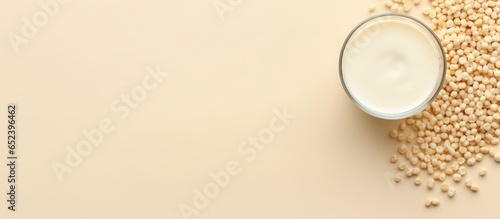 Dried soy milk photographed from above on a isolated pastel background Copy space