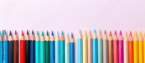 Colored pencils indicate text isolated pastel background Copy space