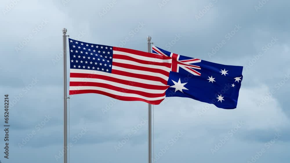 Australia flag and United State or USA flag waving together on cloudy sky, endless seamless loop, two country relations concept Australia flag and United State or USA flag waving together on cloudy sky, endless seamless loop, two country relations concept