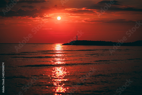 Photos Dark red sunset by the sea
