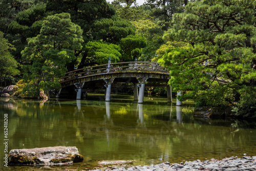 A beautiful bridge spanning a pond on the castle grounds in Kyoto, Japan.