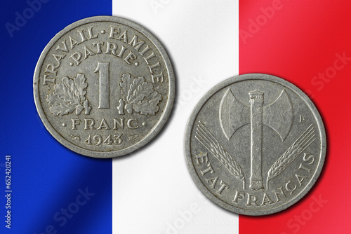 Vichy france franc coin on a national flag