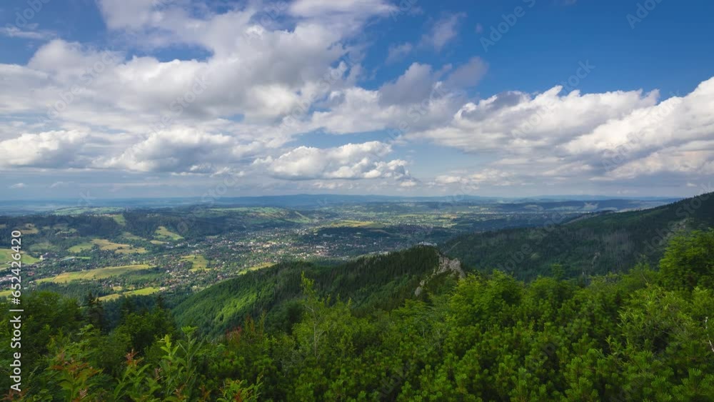 Aerial view time lapse of Zakopane town fom Sarnia Rock (Sarnia Skala) cloudscape. Tatra national park, Poland. Aerial view time lapse of Zakopane town fom Sarnia Rock (Sarnia Skala) cloudscape. Tatra national park, Poland.