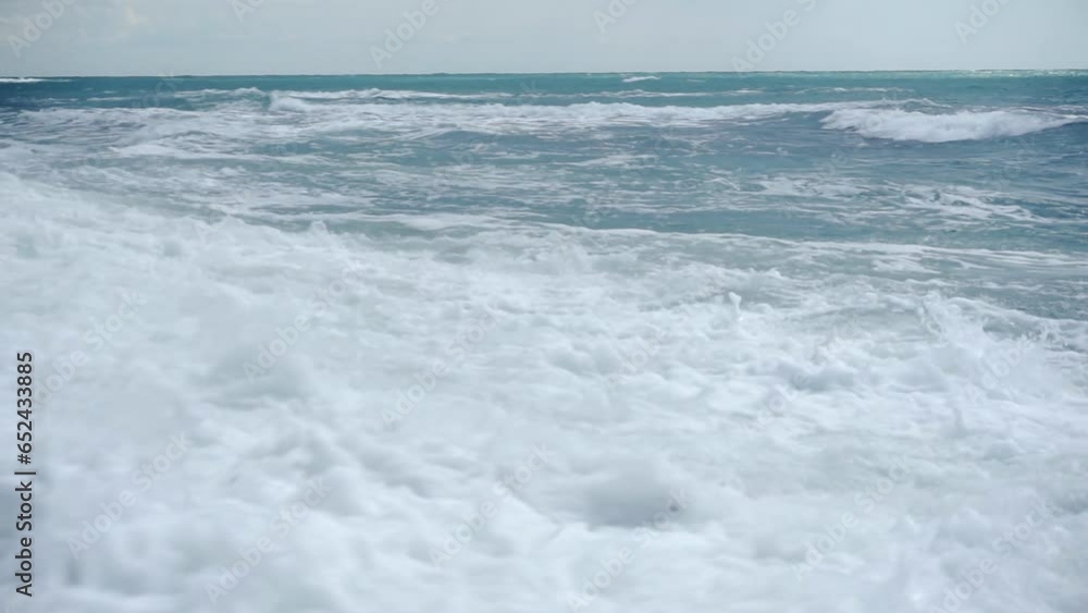 Waves break on the shore Waves break on the shore