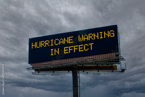 Electronic highway billboard with hurricane warning in effect message