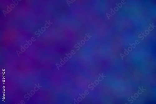 Blue and purple wallpaper, bokeh style. Blurred patches in different shades of blue and purple. Valentine background