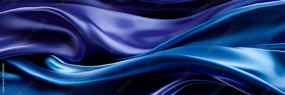 Macro view of glossy fluid-like folds in elegant satin fabric 