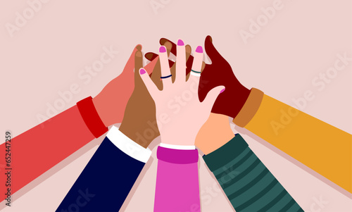 Diversity unity - Vector illustration in flat design with hands of various race and colour coming together. International friendship and multi ethnic teamwork concept