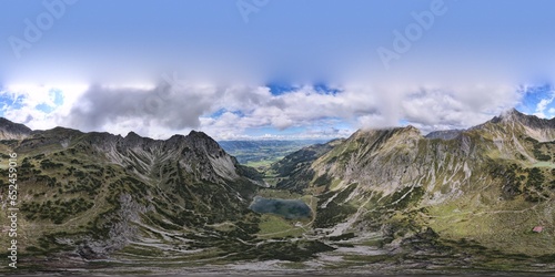 360 degrees panoramic view. Aerial view on the mountain lake high in the alpine mountains. Gaisalpsee, Bavaria. Germany © STV