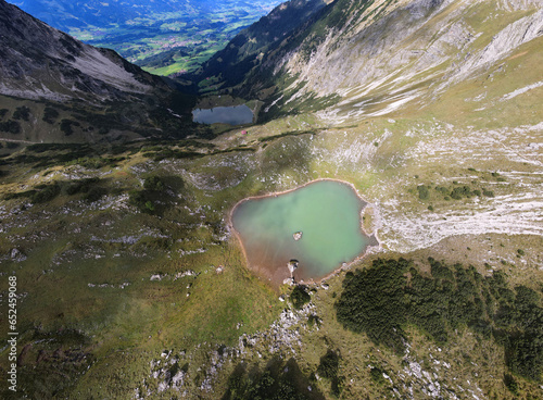 Aerial view on the mountain lake high in the alpine mountains. Gaisalpsee, Bavaria. Germany