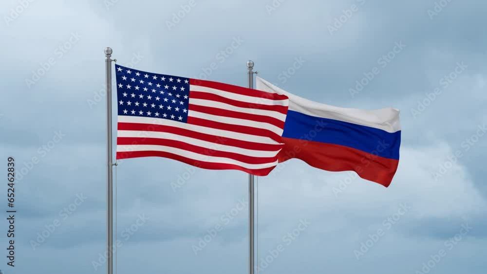 Russian Federation and United State or USA flag waving together on cloudy sky, endless seamless loop Russian Federation and United State or USA flag waving together on cloudy sky, endless seamless loop