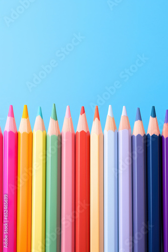 colored pencils background with empty copy space