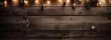 A festive wooden wall adorned with twinkling Christmas lights