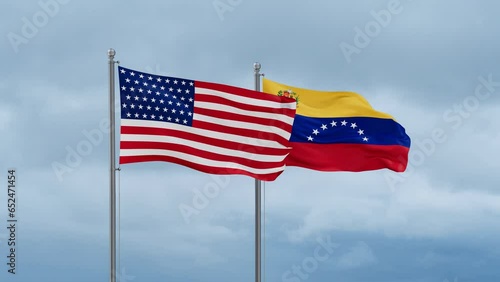 Venezuela and United State or USA flag waving together on cloudy sky, endless seamless loop