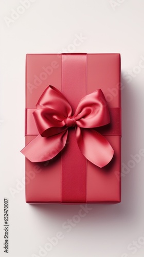 Red gift box with a ribbon and bow