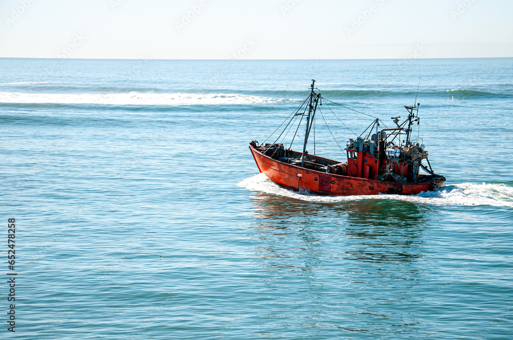 Trawler fishing vessel, leaving the Port of Mar del Plata, Argentina. Trawler fishing vessel, leaving the Port of Mar del Plata, Argentina.