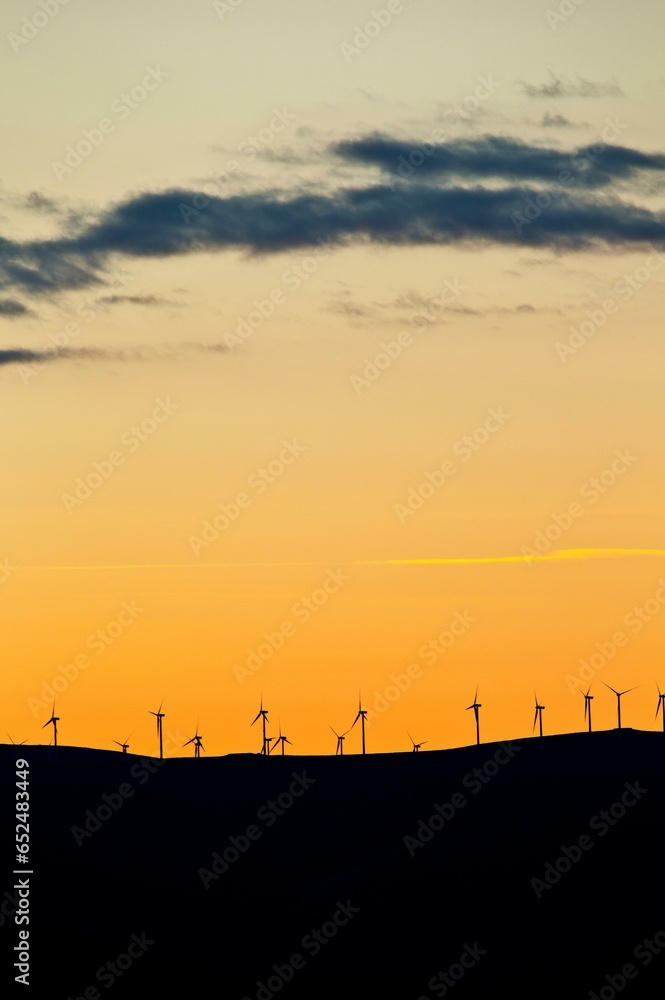 Mountain Wind Turbines at Dawn: Spectacular Yellow Sunset in 4K Mountain Wind Turbines at Dawn: Spectacular Yellow Sunset in 4K