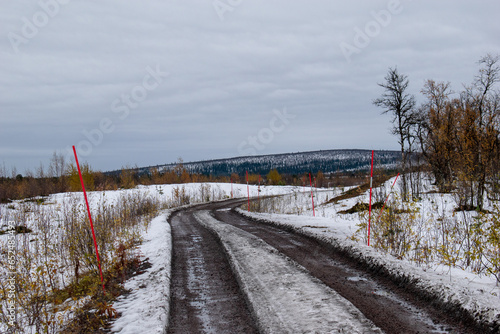 A gravel road in Kiruna, Swedish Lapland next to the Airport. photo