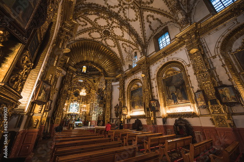 Beautiful church of Santa Isabel seen from the interior with gold details, located in the City of Tlaxcala, Mexico