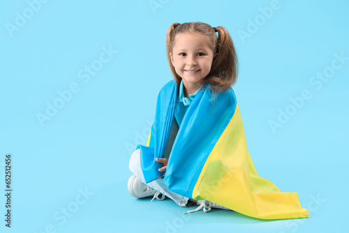 Happy little girl with Ukra...