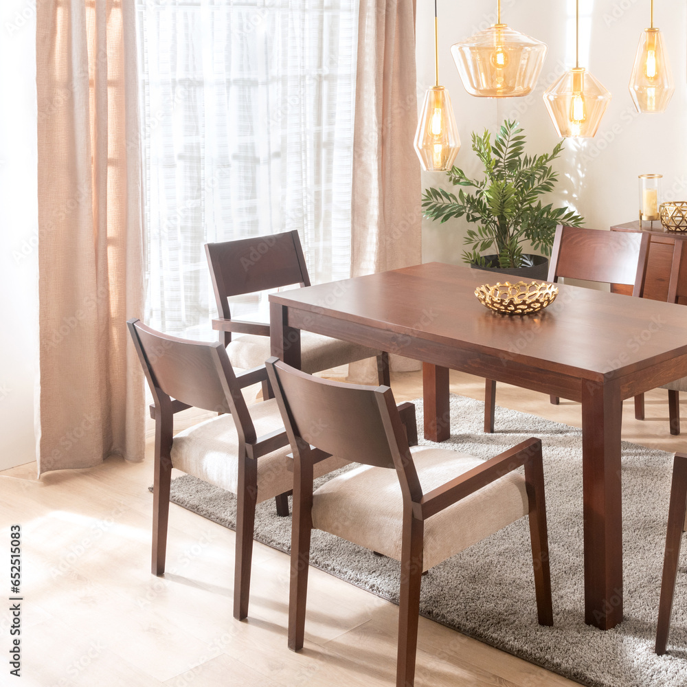 Mid-Century Modern Dining Room Interior Design with Wooden Table and Chairs, Hanging Glass Lighting Lamps, Illuminated by Natural Light from a Large Window, Exotic Plant Accent, Warm Tones