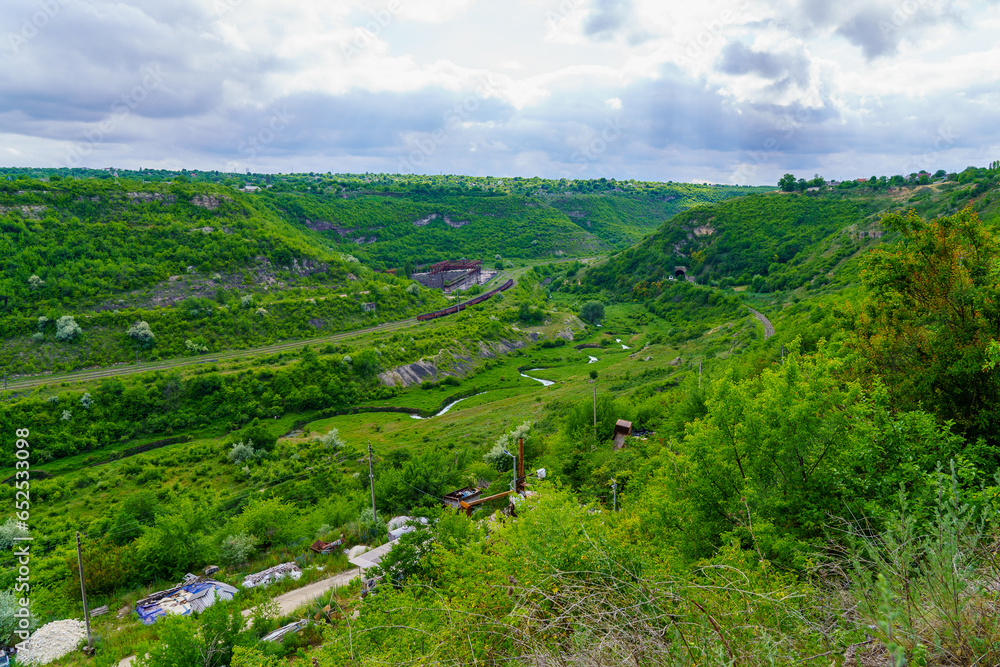 Picturesque green hilly valley. Background with selective focus and copy space
