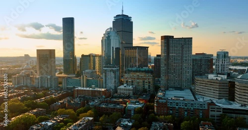 Diverse office towers and skyscrapers in the downtown of Boston. Flight above the beautiful scenery from top. photo