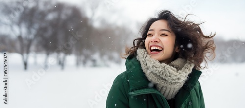Happy Young Asian Woman in ...