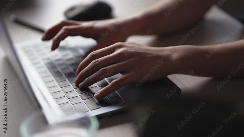Closeup hands typing keyboard on laptop searching information, online working, distance job at home. Closeup hands typing keyboard on laptop searching information, online working, distance job at home.