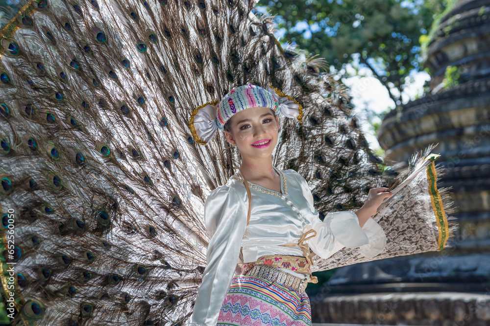 Beautiful Myanmar girl dancing performs imitating bird wings art shown ...