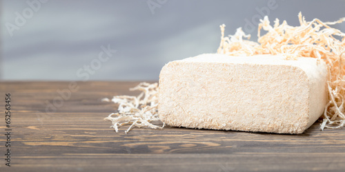 фотографія Wood briquette from wood shavings