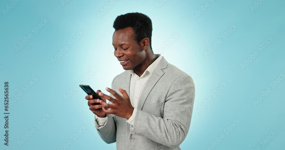 Angry, black man and phone with spam, phishing and digital fail and professional frustrated in studio. Mobile scam, employee with error on app with glitch and internet problem with blue background Angry, black man and phone with spam, phishing and digital fail and professional frustrated in studio. Mobile scam, employee with error on app with glitch and internet problem with blue background