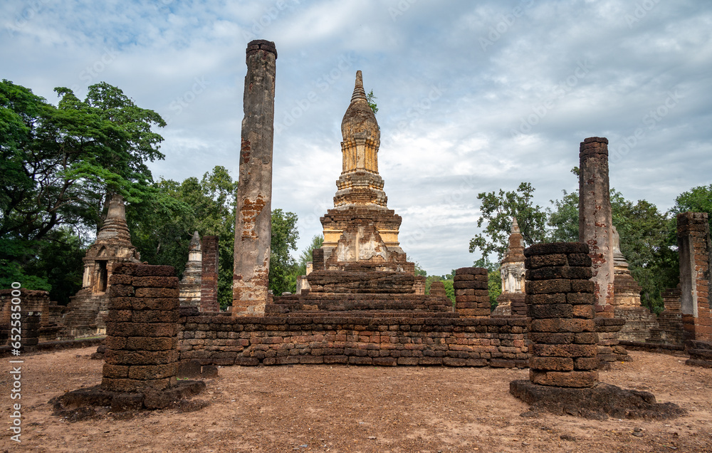 Ancient pagoda in Wat Chedi Jet Thaew the largest temple compound in Si Satchanalai Historical Park of Sukhothai province of Thailand. This temple consists of 32 chedis in various style.