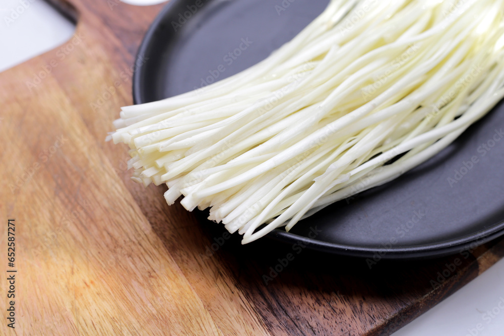 White garlic chives on white backgreound.