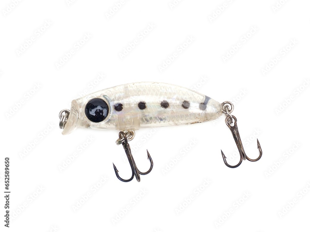 Picture of colorful fish shaped plug baits with 3 way hooks. Fishing equipment isolated on white background. Picture of colorful fish shaped plug baits with 3 way hooks. Fishing equipment isolated on white background.