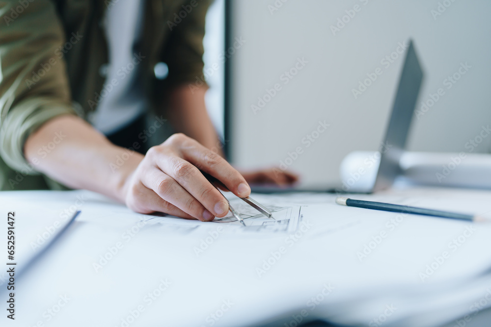 engineering department with work design structure building or house using blueprint computer at working. engineering department with work design structure building or house using blueprint computer at working.