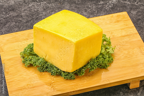 Yellow tilsiter cheese dairy product photo