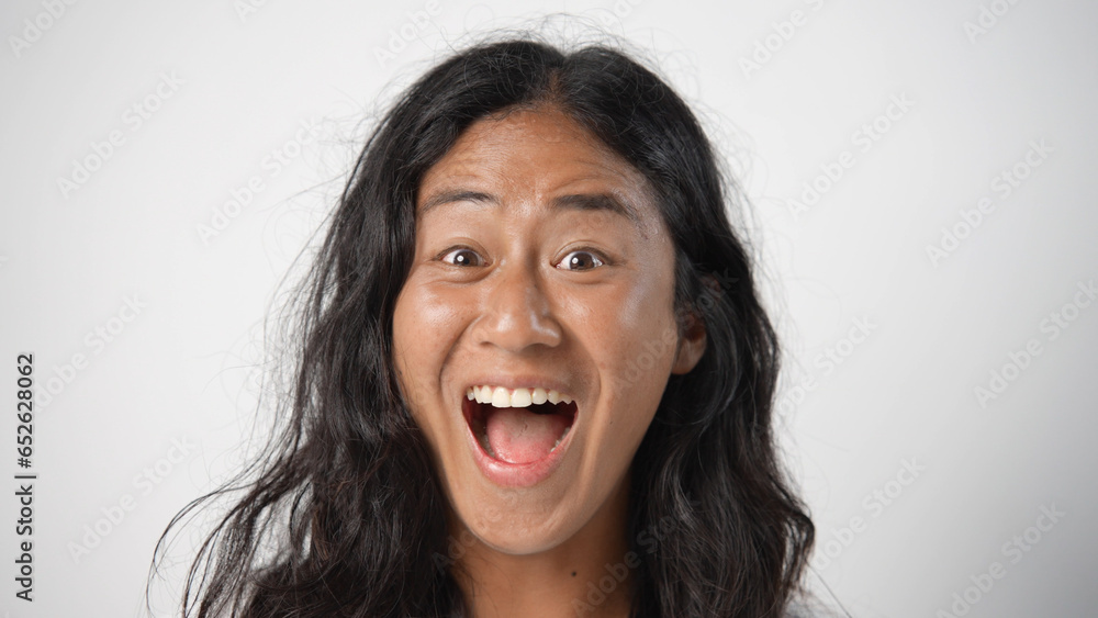 Beautiful person look at camera close up. Young adult woman face portrait. Stylish 30 years old girl on isolated white background. Attractive female feminism model. Modern millennial feminist people. Beautiful person look at camera close up. Young adult woman face portrait. Stylish 30 years old girl on isolated white background. Attractive female feminism model. Modern millennial feminist people.
