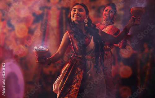 Bengali women performing dhunuchi dance on the occasion of Durga Puja
