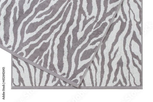 cotton terry towels with an animalistic pattern  stacked  isolated