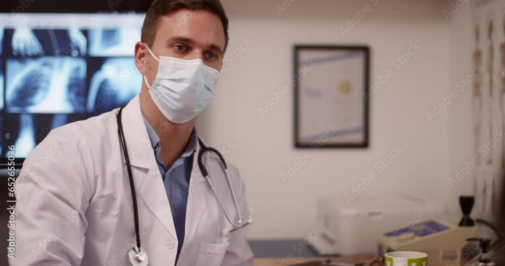 Man, doctor and hands with sanitizer for hygiene, germ and bacterial removal at hospital. Man, doctor and hands with sanitizer for hygiene, germ and bacterial removal at hospital.