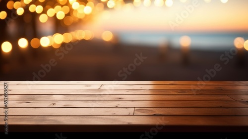 Wooden table and blur beach cafes background.