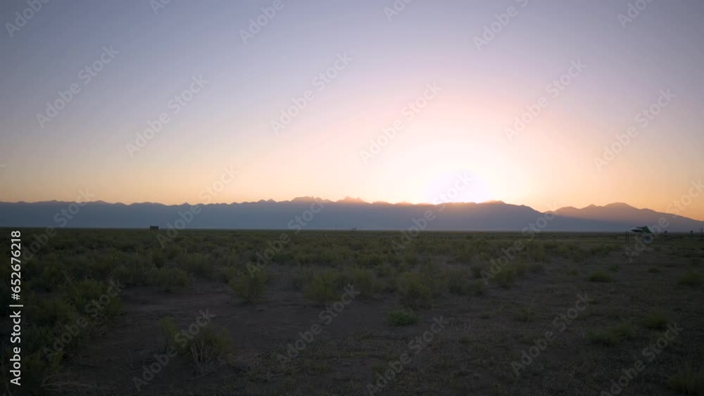 Sunrise peeking over the La Sal Mountains in Crestone Colorado, static time lapse Sunrise peeking over the La Sal Mountains in Crestone Colorado, static time lapse