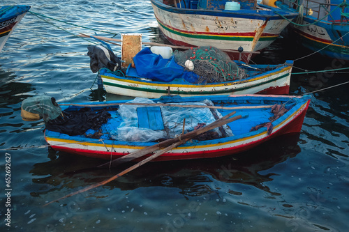 Fishing boats in port of Houmt Souk city on Djerba Island in Tunisia photo