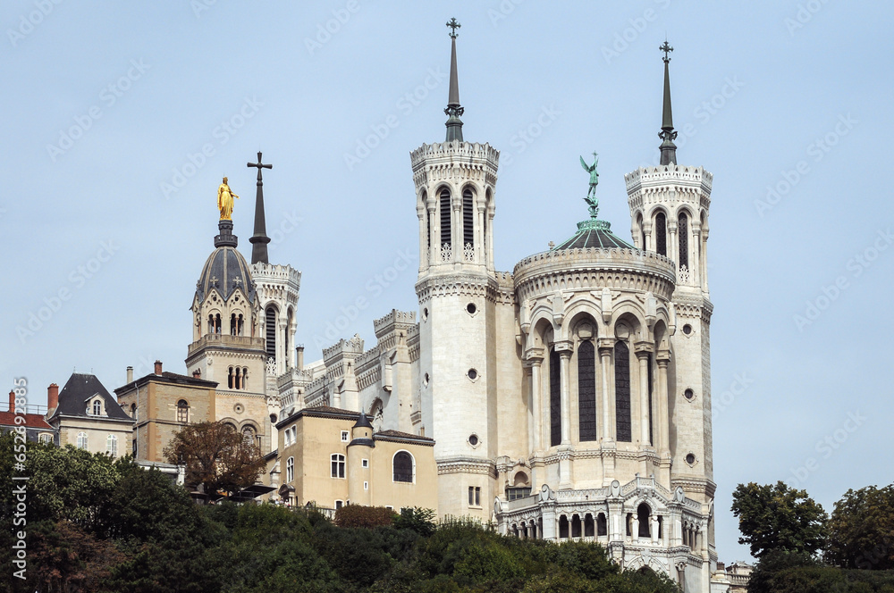 Basilica of Notre-Dame de Fourviere and tower of Chapelle Saint Thomas - Sainte Marie in Lyon city, France