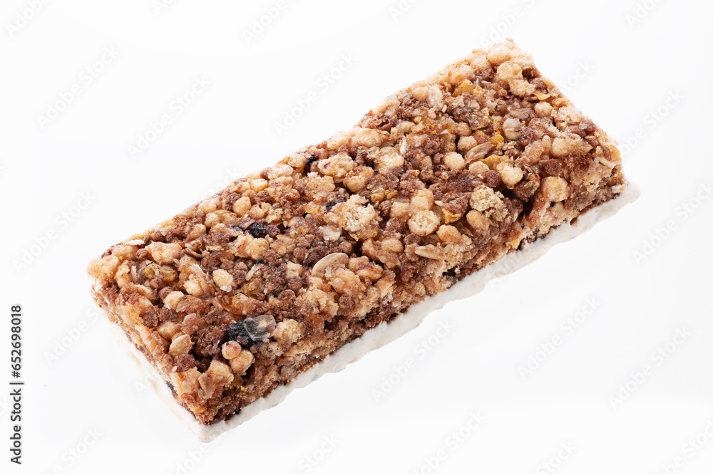 Oat and nut bar isolated on white. Granola bar. Healthy sweet dessert snack. Cereal granola bar with nuts, fruit and berries. Healthy munchies. Oat and nut bar isolated on white. Granola bar. Healthy sweet dessert snack. Cereal granola bar with nuts, fruit and berries. Healthy munchies.